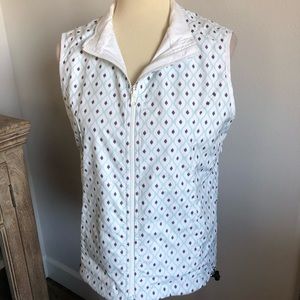 Reversible golf vest, windbreaker material